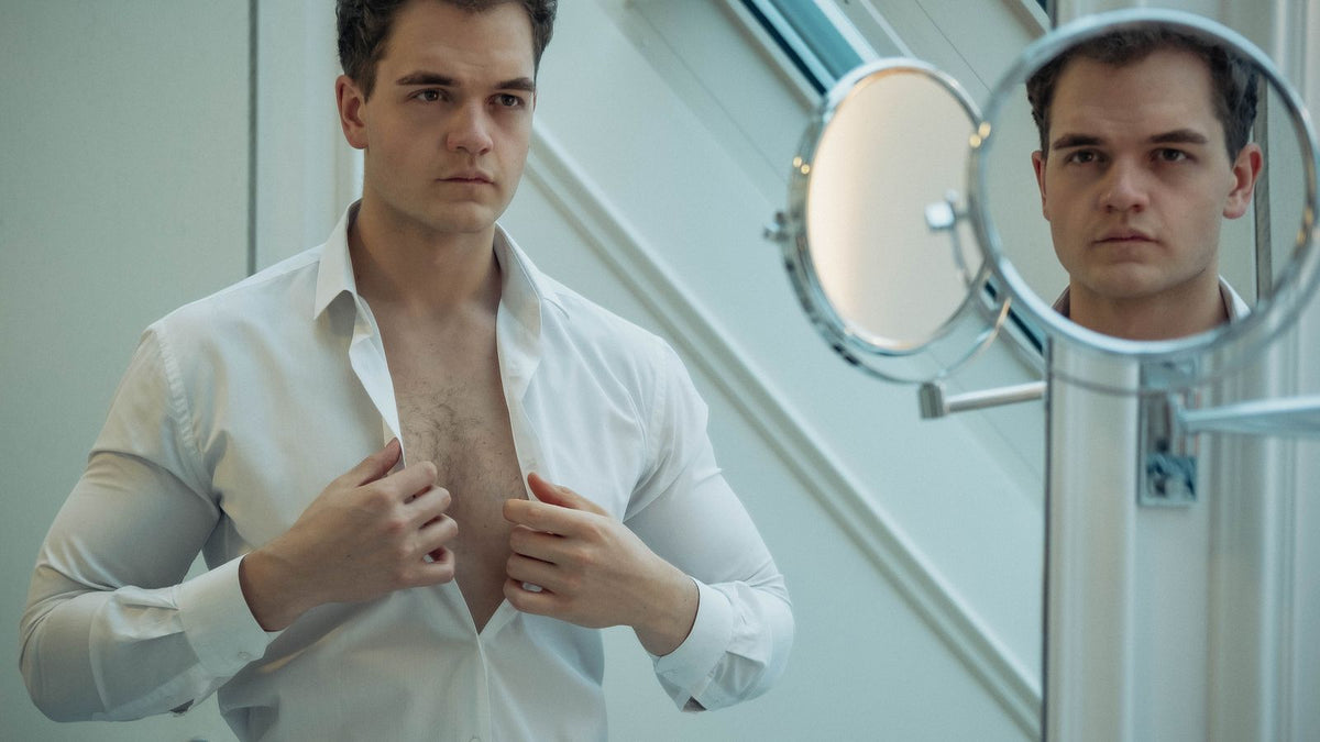 A man dressing with quiet confidence