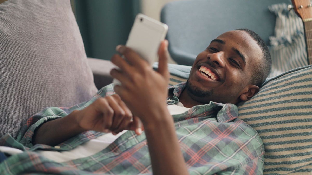 A young man relaxing at home