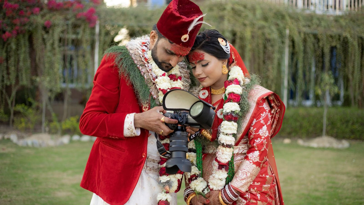 An Indian bride and groom in traditional attire