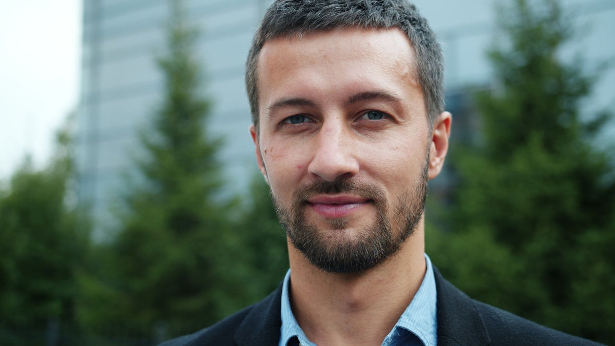 Confident man standing outdoors