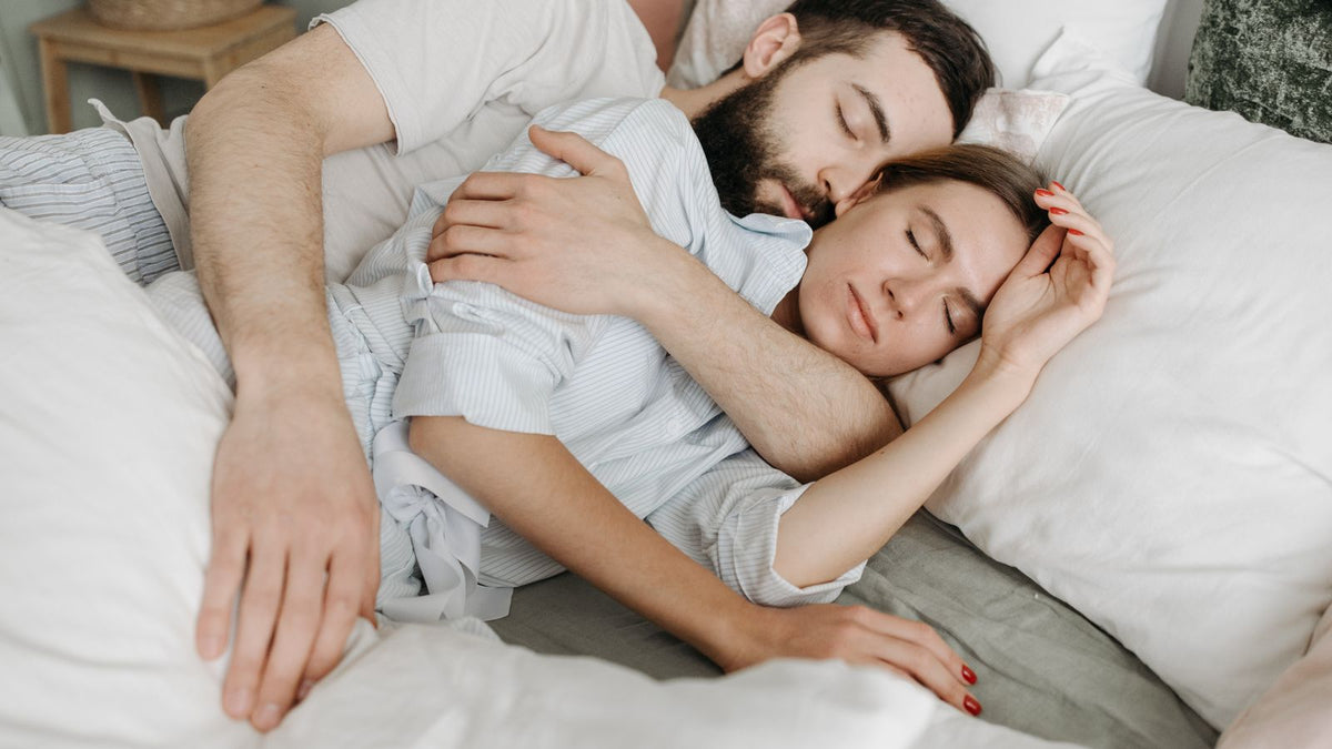 A couple embracing warmly and slowly