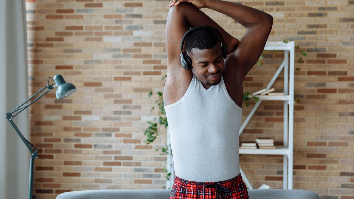 Man stretching during his morning routine