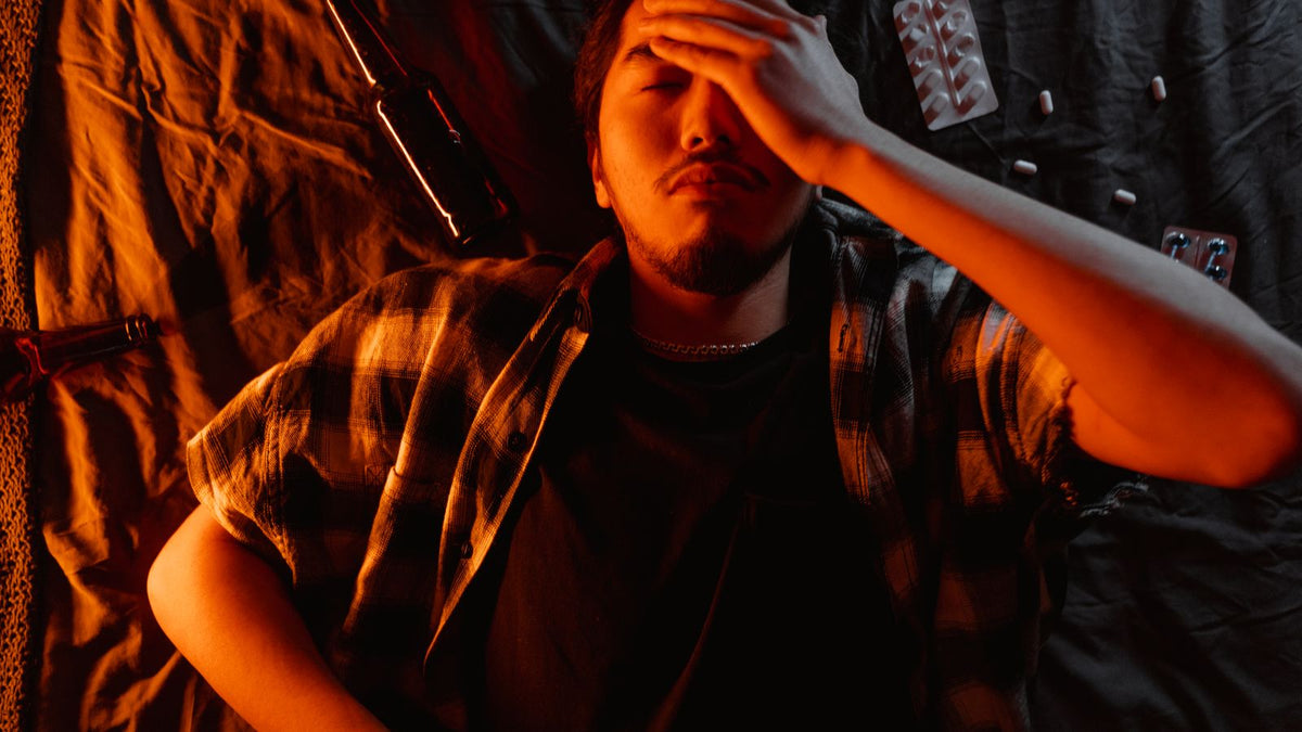 Man lying down looking worried